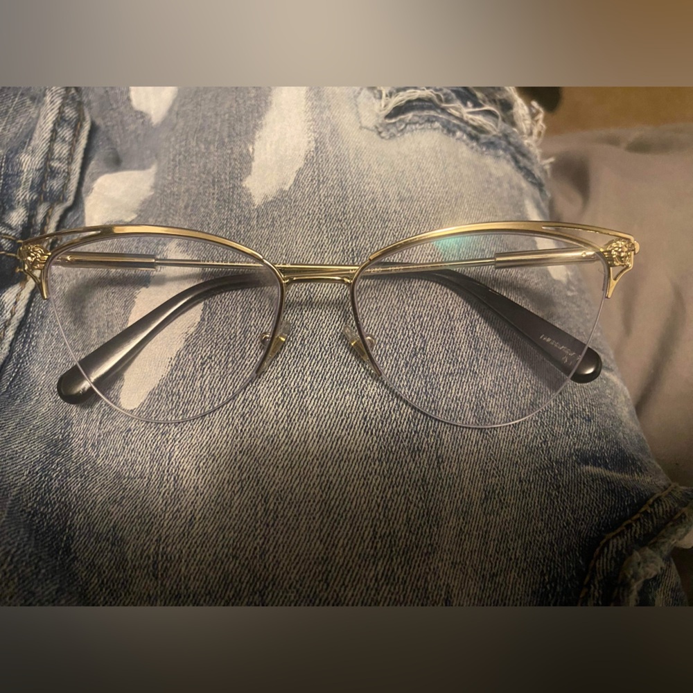 Gold frame Versace glasses